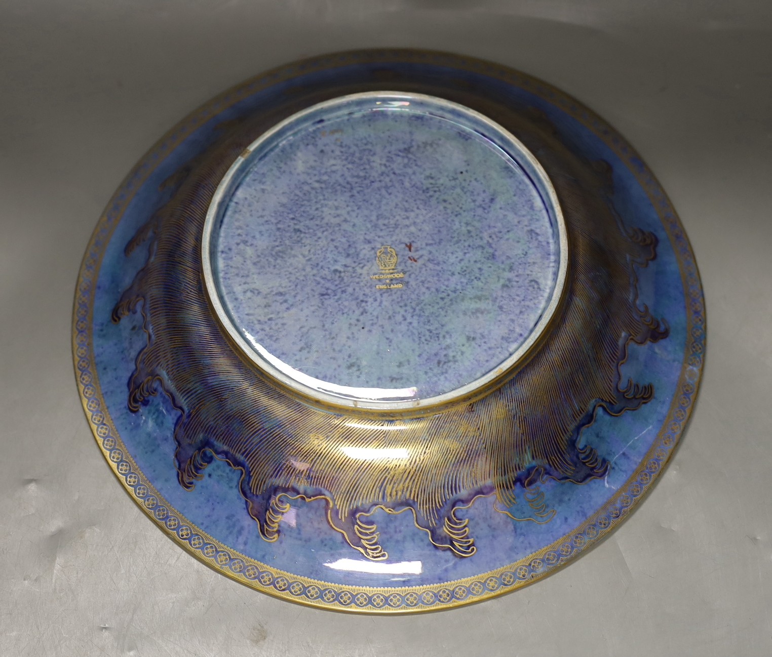 A large Wedgwood lustre dragon shallow bowl, designed by Daisy Makeig-Jones, pattern no. Z4829, 28cms diameter